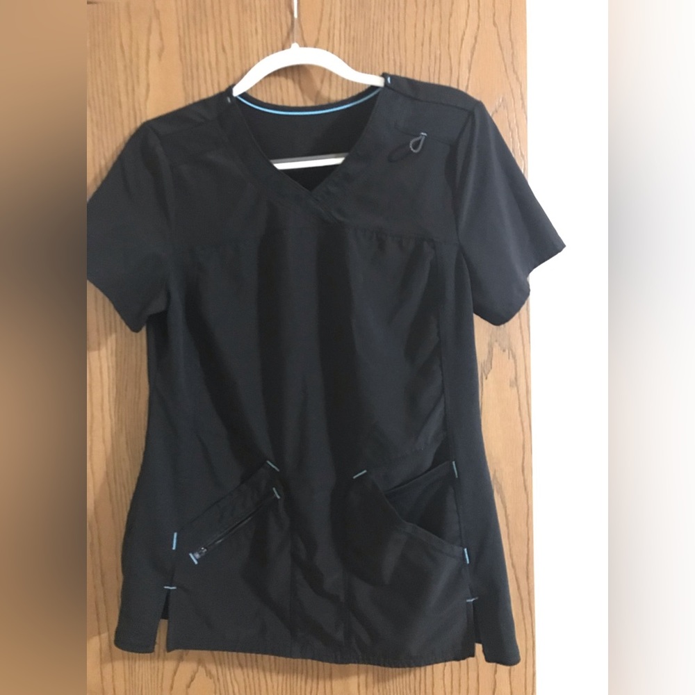 Black Scrubstar scrub shirt. Size S. 90% polyester 10% spandex. 3 pockets.
